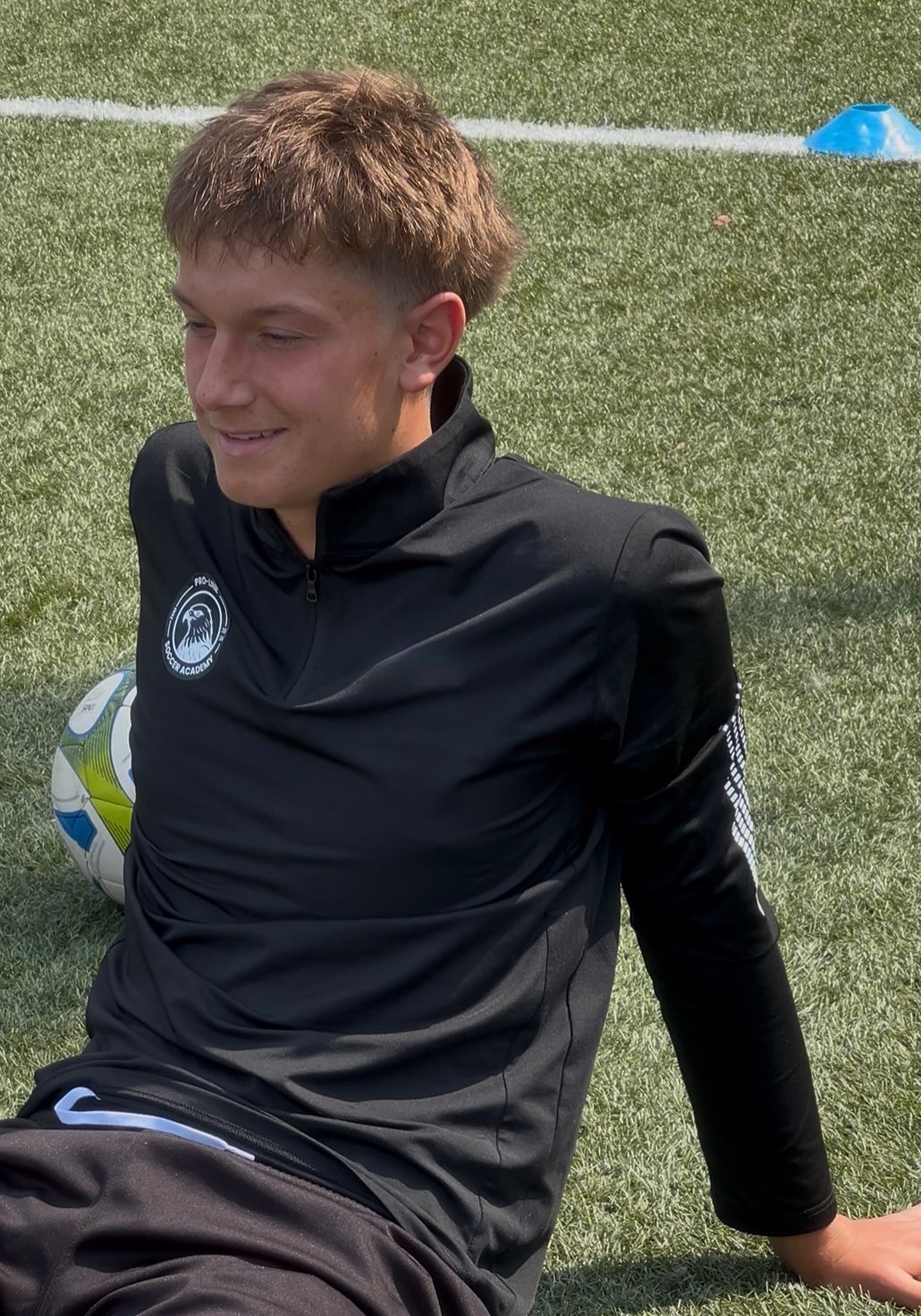 ESA player wearing the black long-sleeve uniform shirt